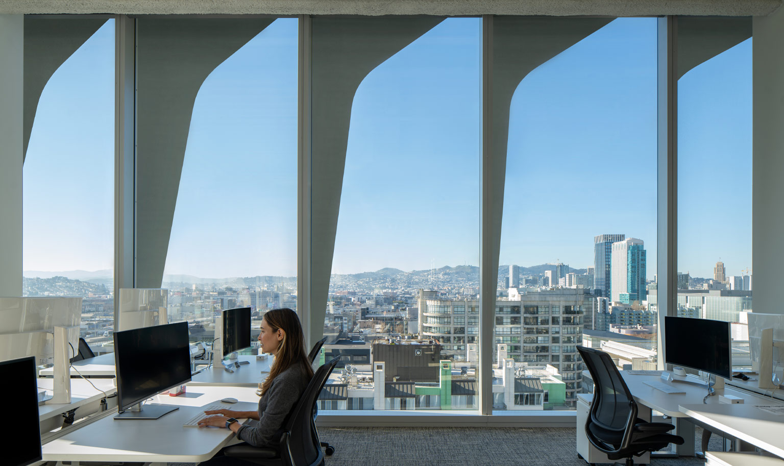 Woman at desk with views